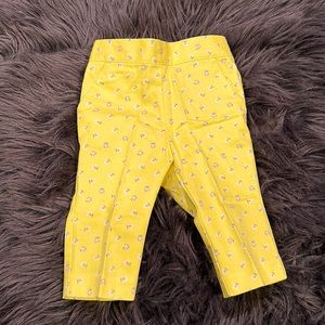 Bright yellow and flower print pants